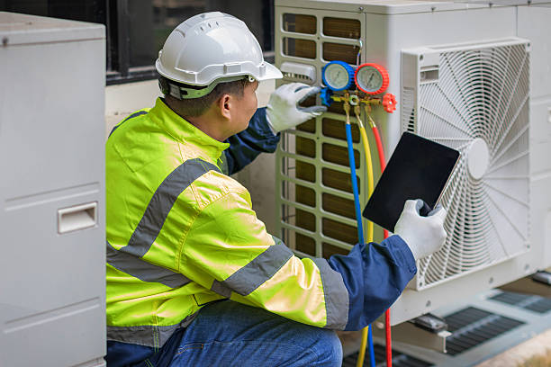 Professional Heat Pump Repair technician working in Ashland, MO
